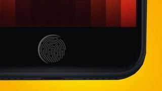 iPhone SE على خلفية برتقالية