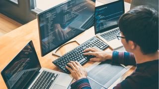 Developers writing code