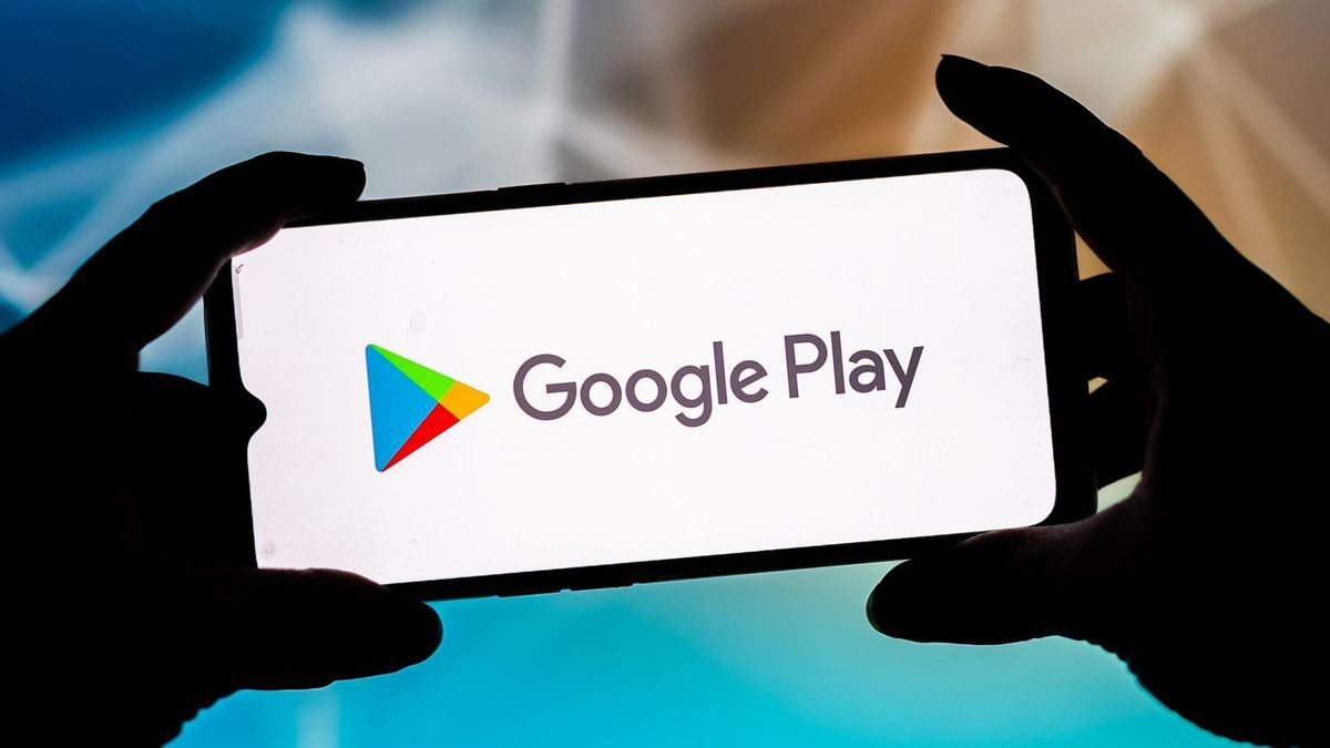 In this photo illustration a Google Play logo seen displayed on a smartphone.