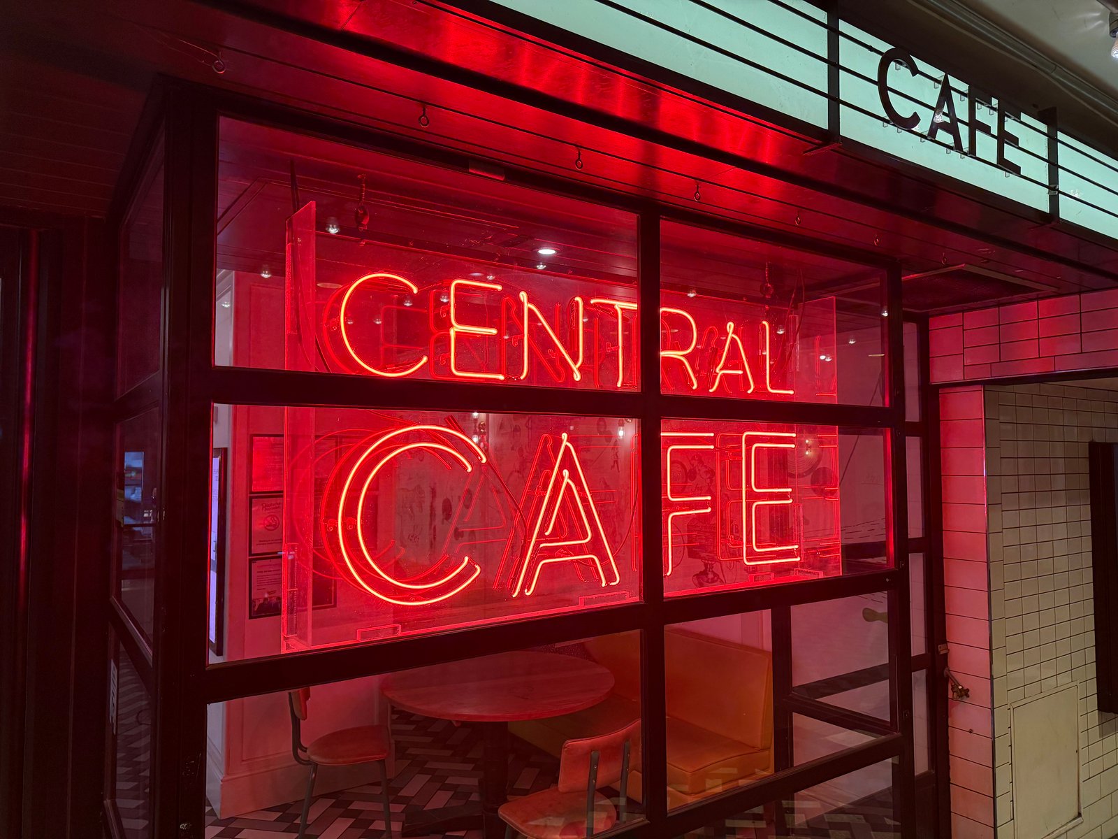 iPhone 16 Pro camera sample neon sign low light