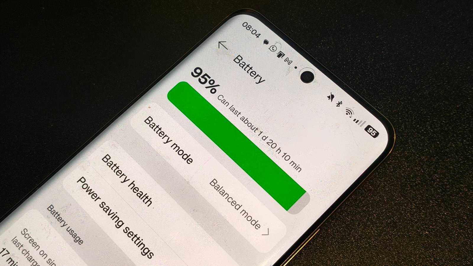 A battery-saving setting shown on a Realme GT5 Pro.
