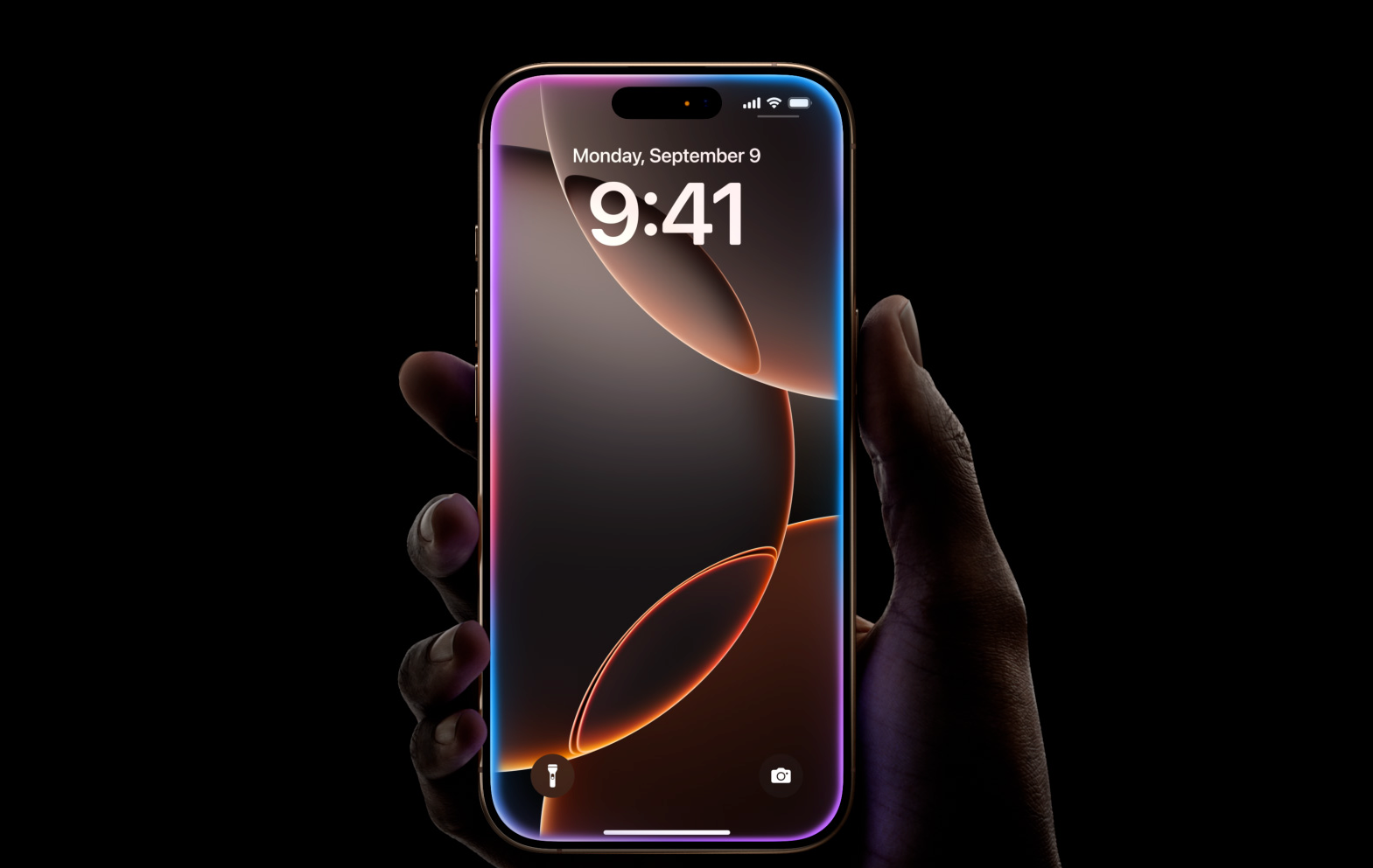 صورة عرض لـ iPhone 16 Pro على خلفية مظلمة