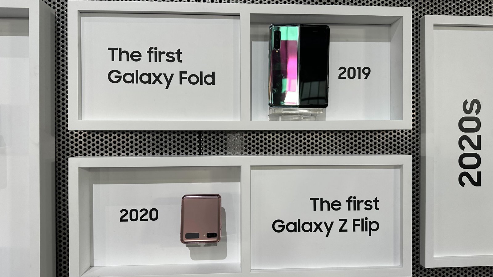 A display showing two Samsung Galaxy foldables